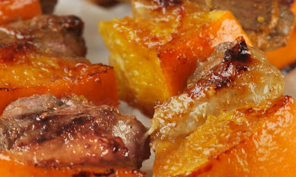 Brochetas de pato con naranja